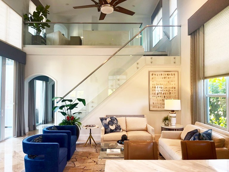 Completed custom glass stair railing installed by Architectural Glass and Design