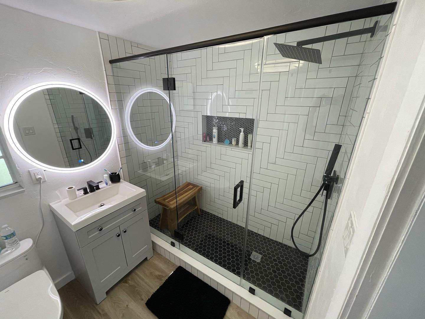 Modern frameless shower enclosure in a residential bathroom