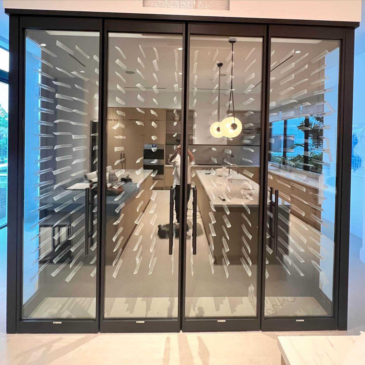 Custom glass enclosed residential wine room