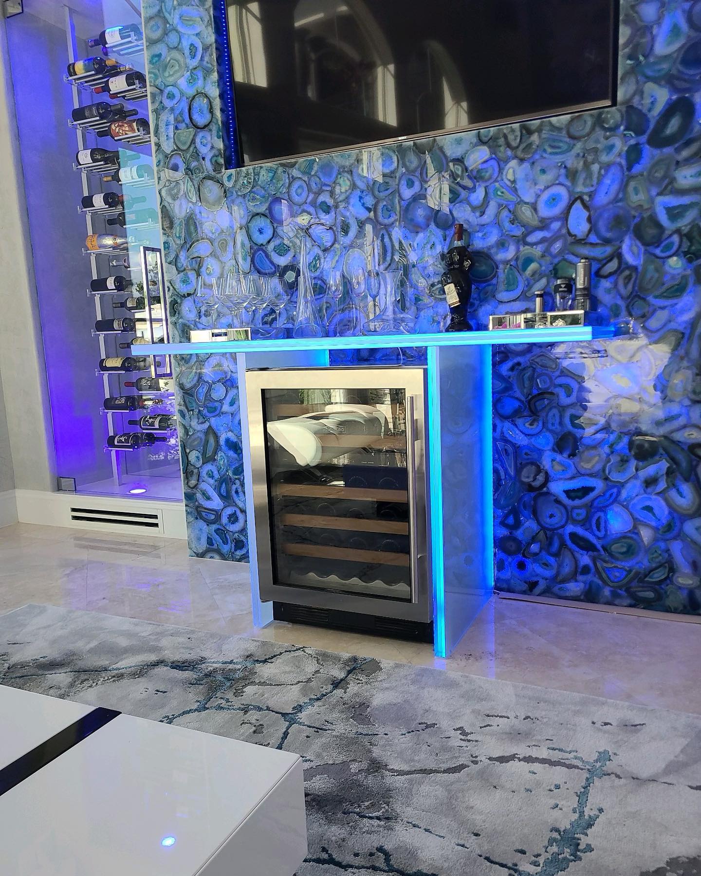 Custom glass enclosed wine room installed by Architectural Glass and Design