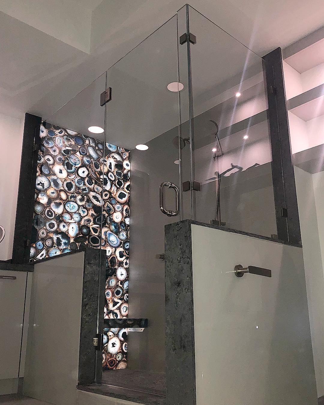 Luxury shower featuring integrated LED wall lighting