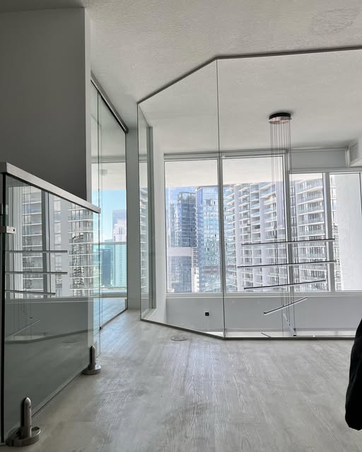 Custom glass safety wall installed by Architectural Glass and Design