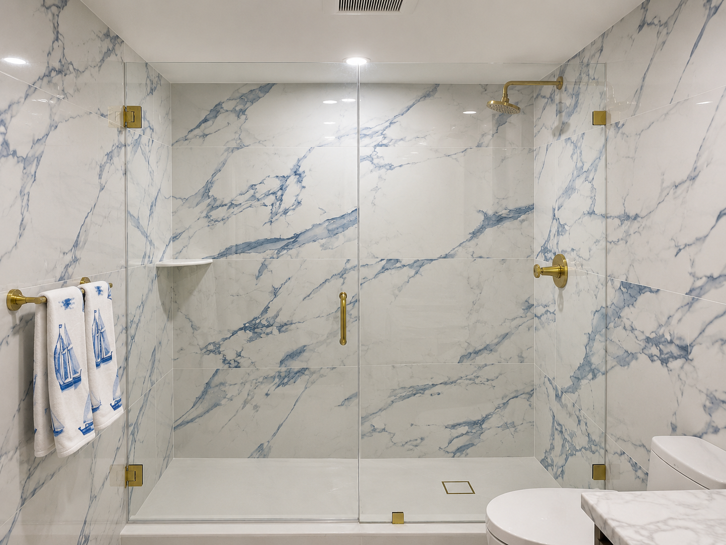 Custom floor-to-ceiling frameless shower enclosure